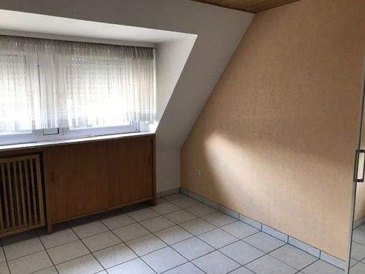 Ein Raum im Dachgeschoss