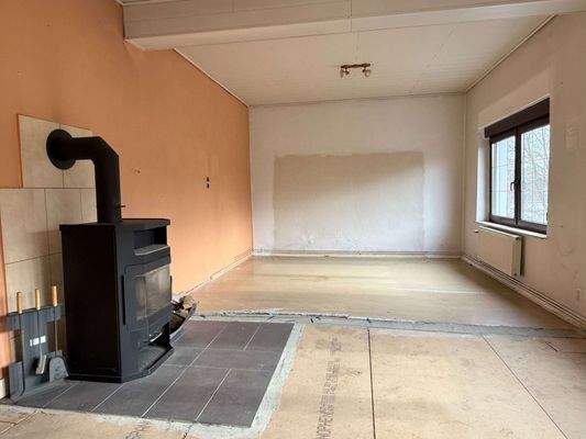 Wohnzimmer mit Kamin