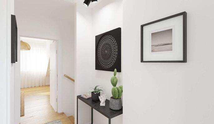 Ein breiter Flur bietet Platz für Regale und Deko