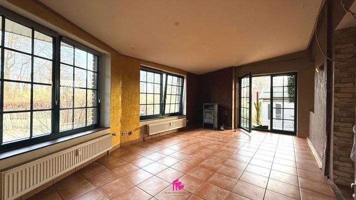 Wintergarten mit Kamin