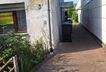 Einfahrt bzw. Eingang zu den Garagen und Garten
