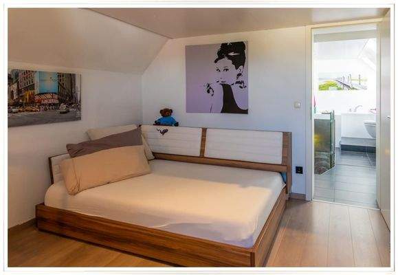 Eins der 2 Schlafzimmer