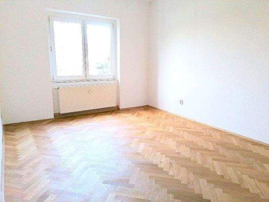 Schlafzimmer mit Parkett