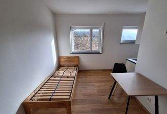 Schlaf- und Essbereich