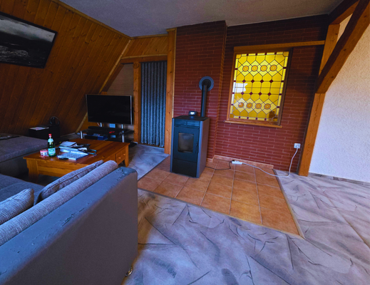 Loungeecke im Wohnbereich des Dachgeschosses.png