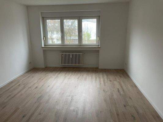 Wohnzimmer mit Holzfussboden