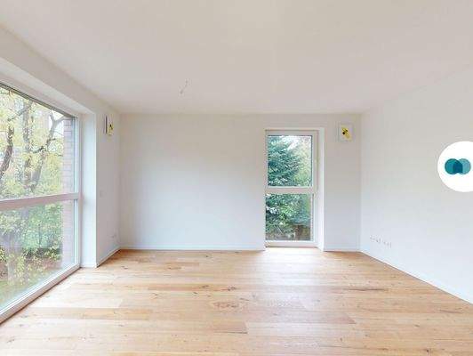 Ansicht II: Wohn- und Esszimmer mit offenem Küchenbereich