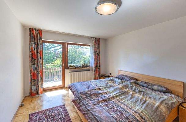 Schlafzimmer mit Balkonzugang
