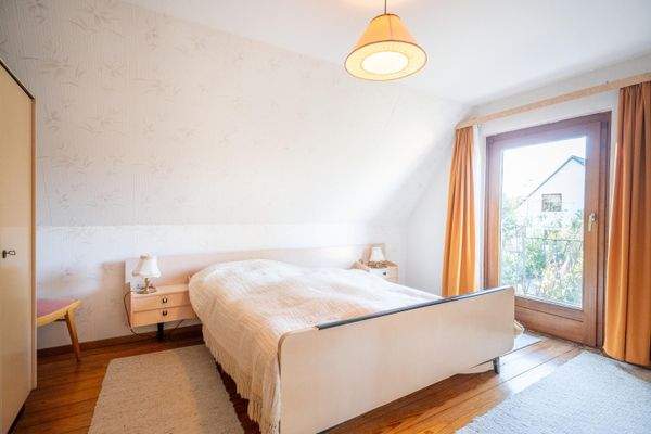 Schlafzimmer mit Balkon