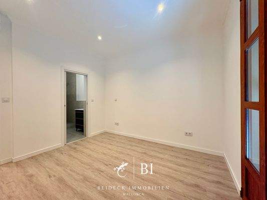 Schlafzimmer mit Bad en suite