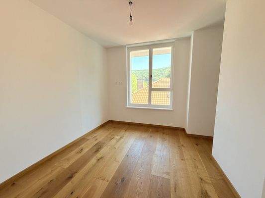 Schlafzimmer mit Ankleidebereich