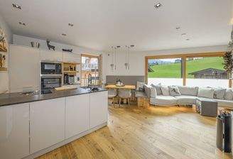KITZIMMO-Exklusives Ski in / Ski out Apartment in zentraler Lage - Immobilien Kirchberg.