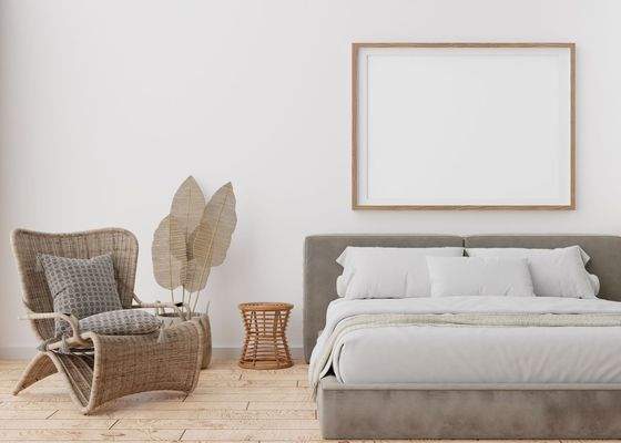 Schlafzimmer mit Bett und Sitzmöbel