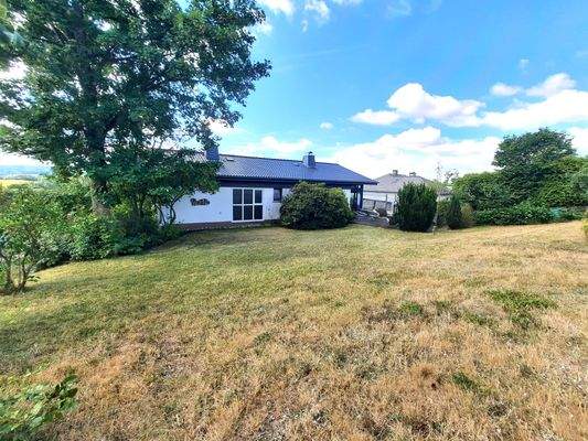 Haus-,  Gartenansicht