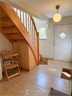 Holztreppe in das Dachgeschoss