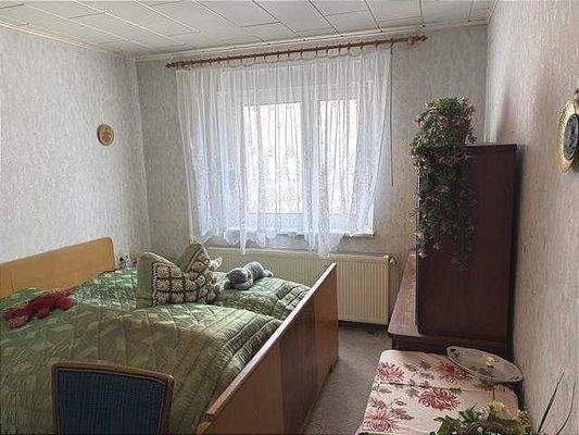 Schlafzimmer Nebengebäude mit Gästewohnung