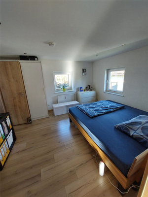 Schlafzimmer in der Wohnung im OG rechts