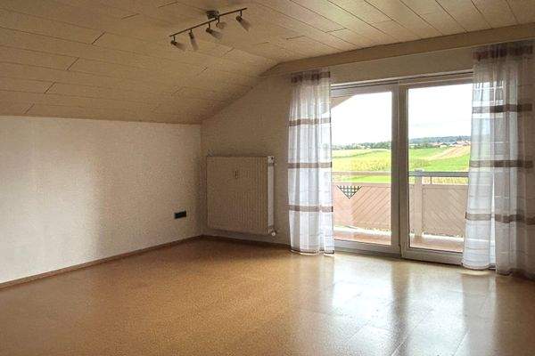 Schlafzimmer mit Balkon im OG