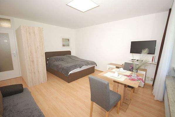 Wohnzimmer mit Schlafnische