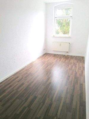 Schlafzimmer mit Laminat