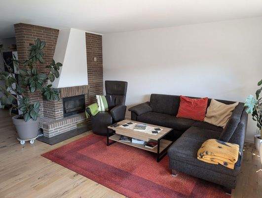 Wohnzimmer mit Kamin