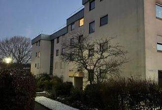 1 Wohnanlage Front mit Haupteingang