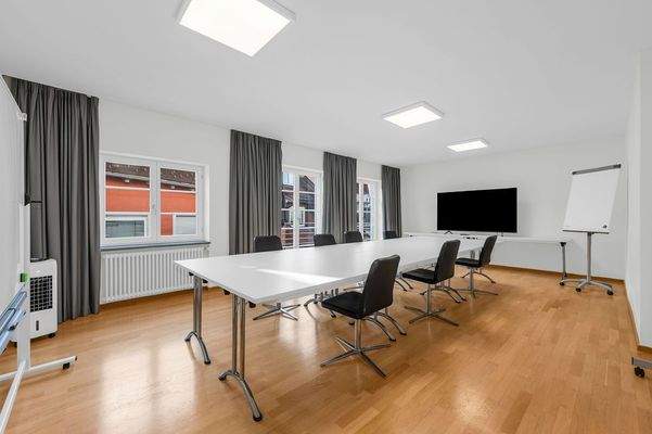 Wohn-/Essbereich mit Zugang zum Balkon