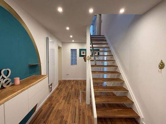 Flur und Treppenaufgang ins Dachgeschoss