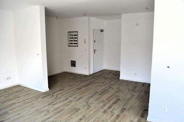 Wohnzimmer in Richtung Wohnungseingang.JPG
