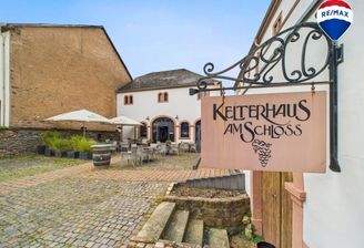 RE/MAX Immobilien DeLux Kelterhaus Gaststätte am Schloss Ayl