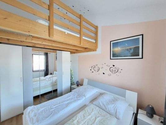 eines der Schlafzimmer