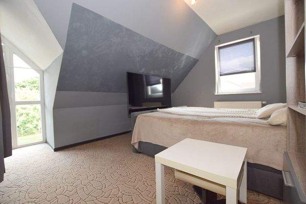 Im Dachgeschoss stehen 3 Zimmer zur Verfügung