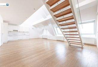 Wohn- / Esszimmer (ca. 56,10 m²) mit Küchenzeile und Aufgang zur Terrasse