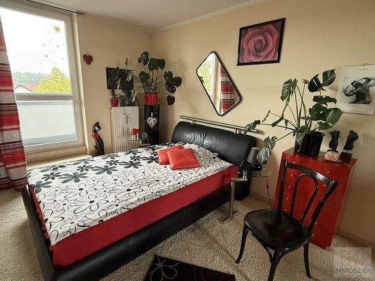 Schlafzimmer mit Balkon