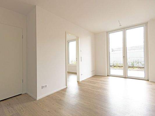 Wohnbereich mit Terrassenzugang WE 0.02