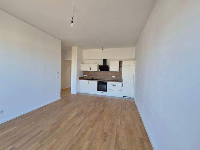 Wohnung mit EB- Küche - Erstbezug, Balkon u. Fußbodenheizung - Foto 2