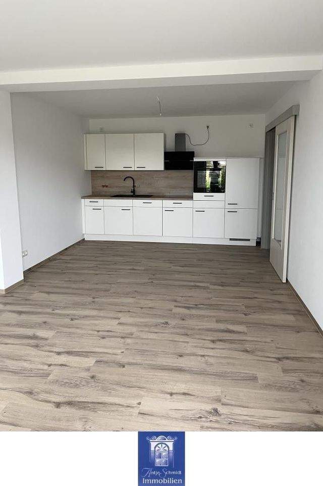 Rollstuhlgerechte Wohnung mit Fußbodenheizung, edlem Bad, moderner EBK, Terrasse! - Foto 1