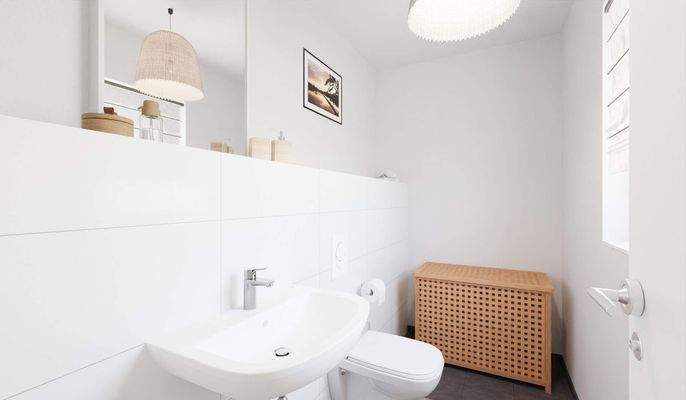 Modern gefliestes Gäste-WC im Erdgeschoss