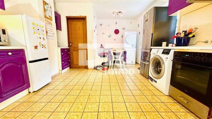 WE1 EG Küche mit Einbauküche / Zugang Terrasse