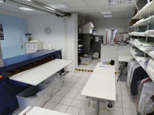 Textilreinigung und Heißmangel