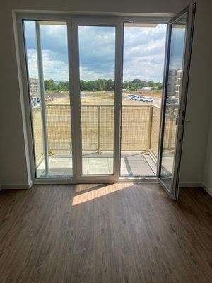 Wohnzimmer mit Balkon 13-WA0026