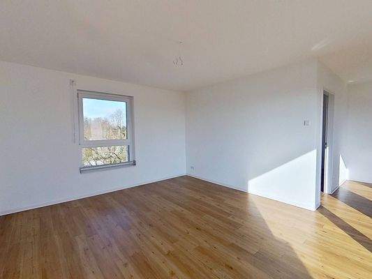 Ansicht III: Wohn- und Esszimmer mit offenem Küchenbereich