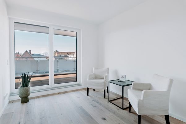 Schlafzimmer mit Zugang zur Dachterrasse