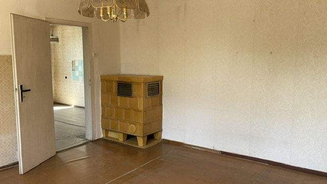 Zimmer OG mit zusätzlichem Ofe