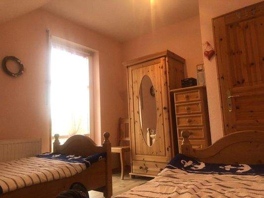 Schlafzimmer mit Balkonzugang