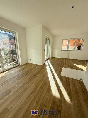 Wohnzimmer mit Gartenzugang