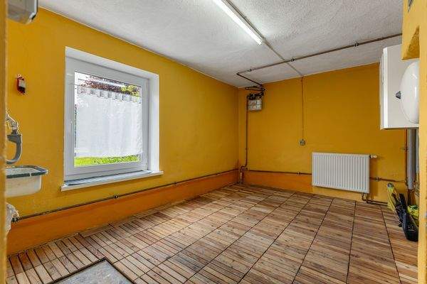 Hauswirtschaftsraum mit Heizung