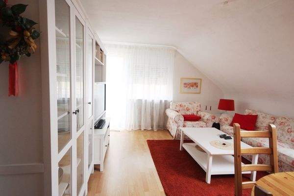 Wohnzimmer mit Balkon