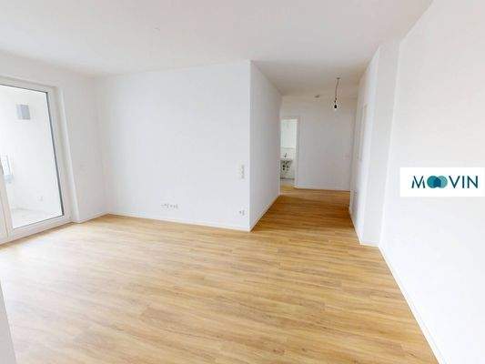 Ansicht III: Wohn- und Esszimmer mit offenem Küchenbereich