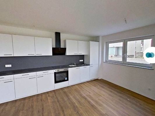 Ansicht IV: Wohn - und Esszimmer mit offener Küche